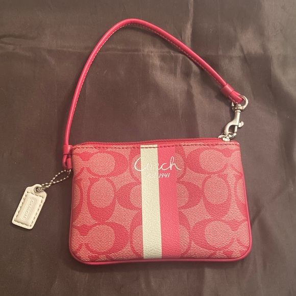 Coach Handbags - Genuine Coach Heritage Pink and White Wristlet. Signature Wristlet leather trim